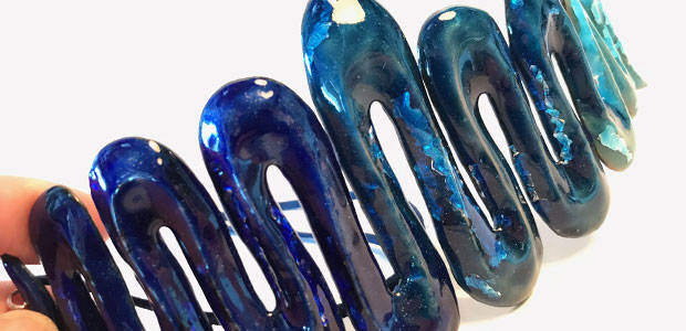 Three blues Wave Pendant | Copper and enamel | Height 2.5cm x Length x 19 cm x Width 9.5 cm | Wire scored pendant with silver foil under transparent vitreous enamel. Photo Cara Murphy